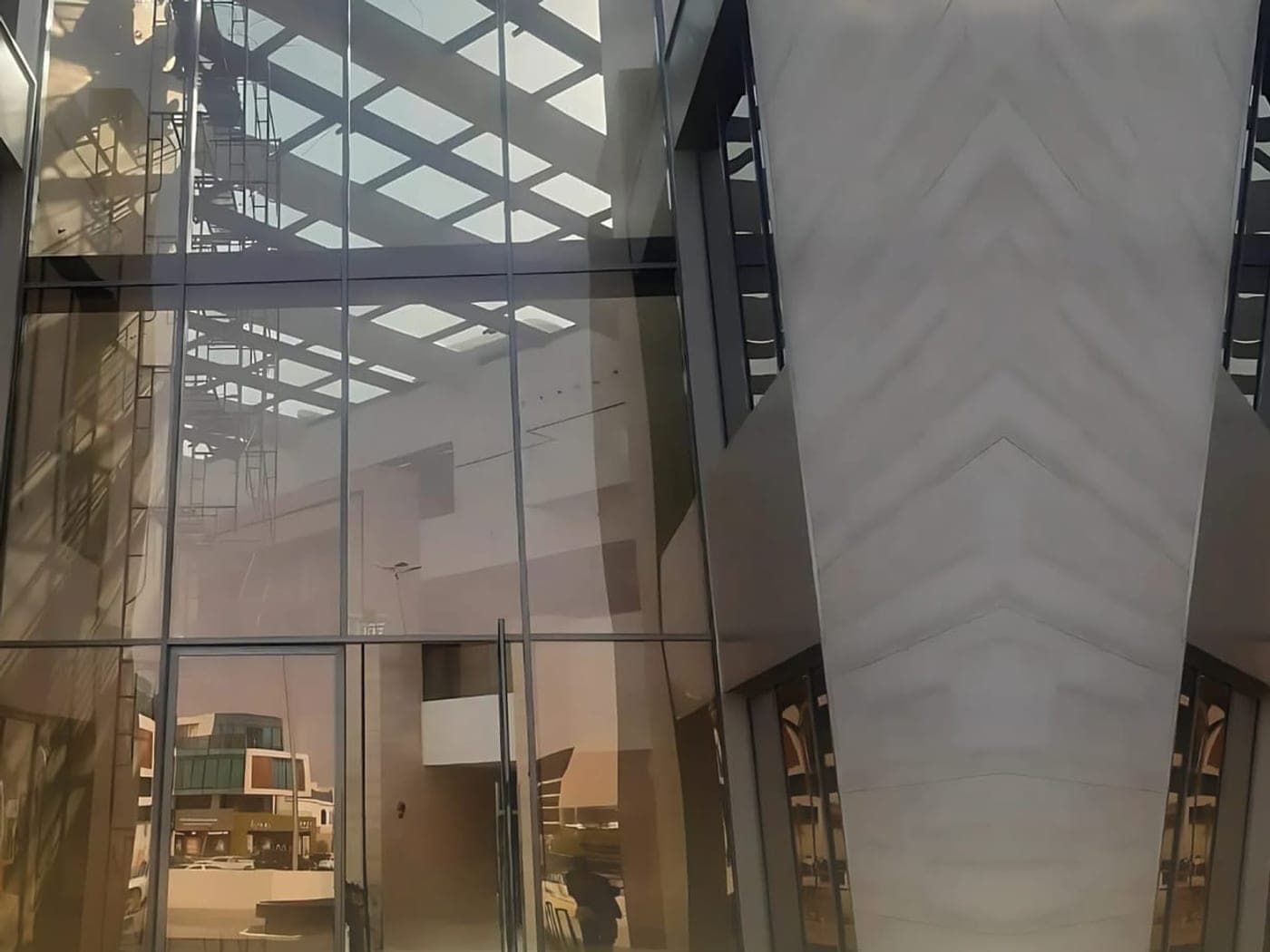 Spider system frameless glass facade in Riyadh