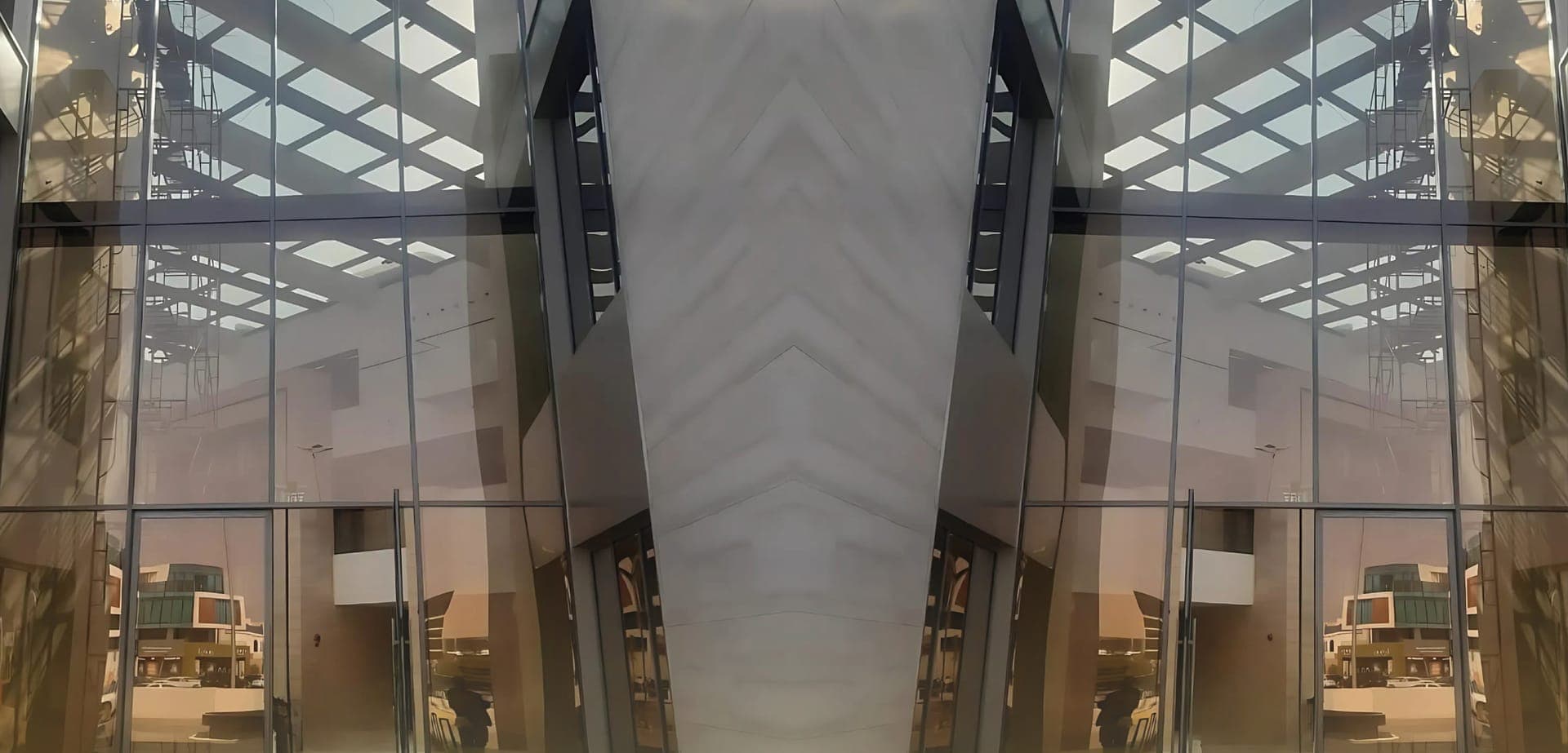Frameless glass entrance facade with diagrid skylight in Riyadh