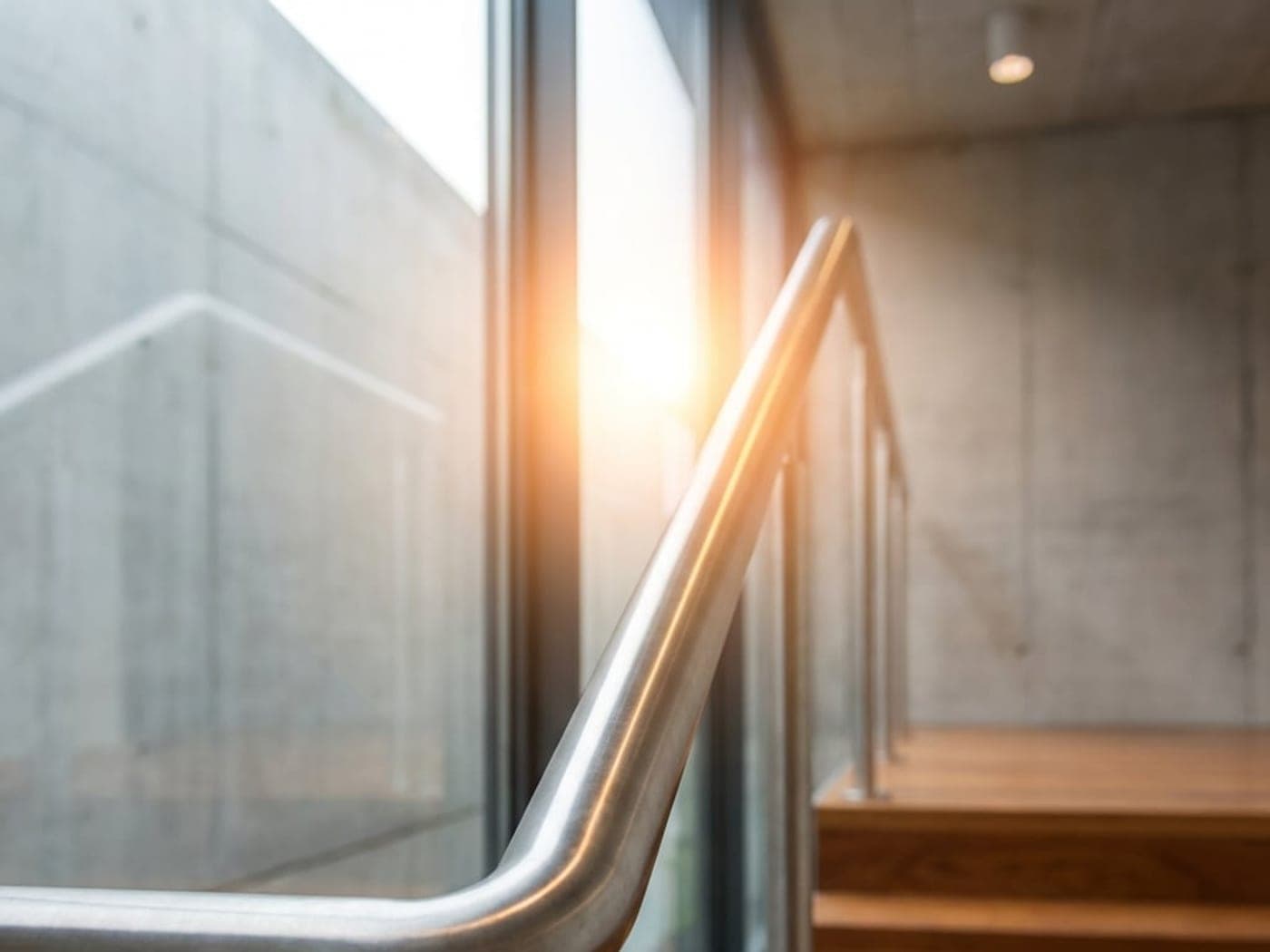 Stainless steel handrail detail on a staircase
